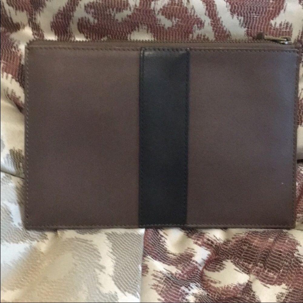 Still available new  flat wallet / zippered bag